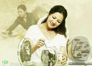 Người thổi hồn vào tranh cát nghệ thuật Ý Lan - hình ảnh
